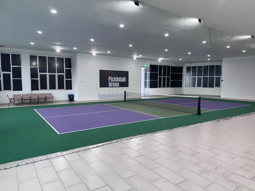 Covered aircon training court with TPA logo